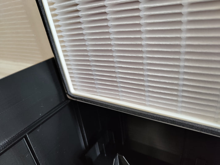A close-up of the HEPA filter inside an extra-large laminar flow hood, showing its fine pleated structure and secure housing.